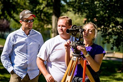 Civil Engineering students and faculty at Rose-Hulman use surveying instruments in the field.