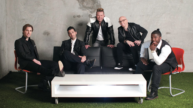The five member of VoicePlay seated