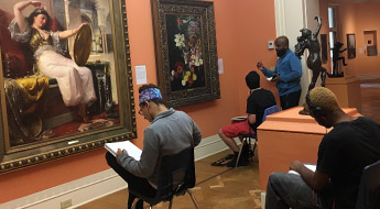 Students sketching in a museum gallery