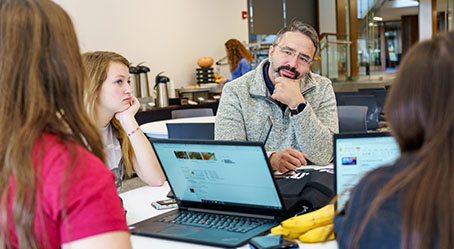 Rose-Hulman alumnus meets with current students in a pitch session.