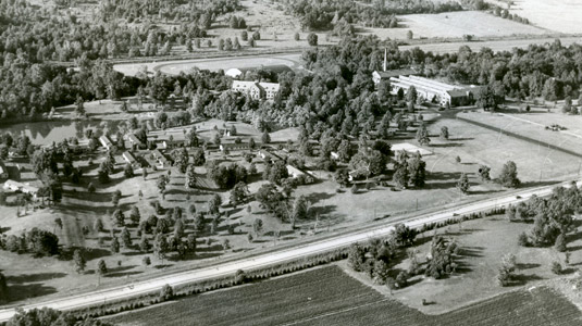 Historical photo, aerial view of campus with Moench Hall and Deming Hall.