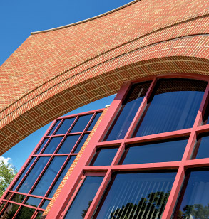 Exterior shot of arched entrance to Olin Advanced Learning Center