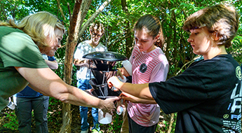 Students working in the field.