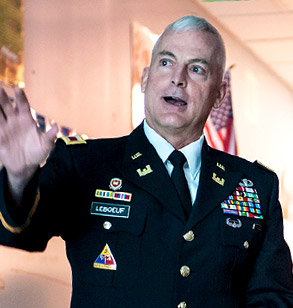 Close-up of Gene LeBoeuf in uniform as he waves his hand