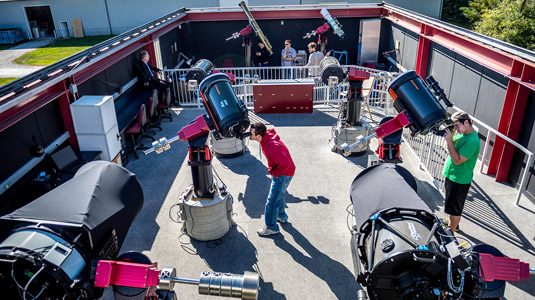 Students use telescopes in the Oakley Observatory during the day.
