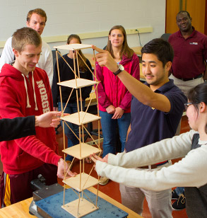 Students building small scale structure