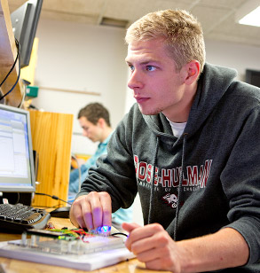 Student testing a circuit