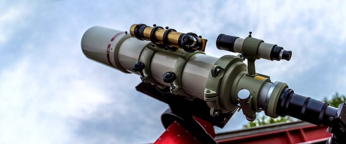 A skyward-pointing high-powered telescope at the Oakley Observatory. 