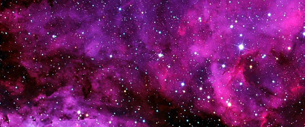 The purple hazy clouds of the beautiful Carina Nebula.