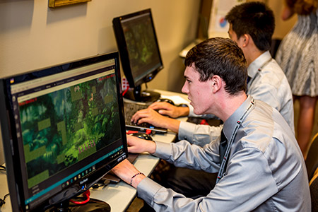 Operation Catapult students at Rose-Hulman work on a computer programming project.