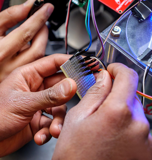 Student works on a circuit.