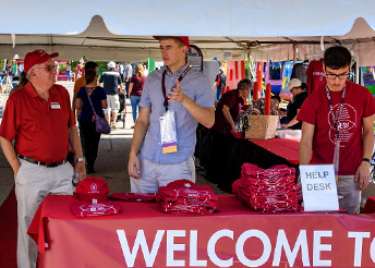 !Volunteers working at homecoming