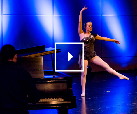 Female student dancer performing a ballet on the stage in Hatfield Hall Theater.