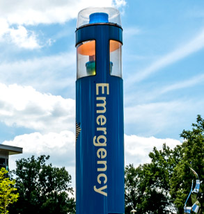 Blue emergency call box on campus