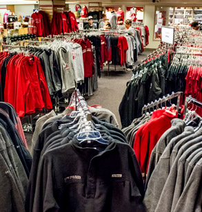 Image shows racks of Rose-Hulman sweatshirts and other clothing for sale in the campus bookstore.