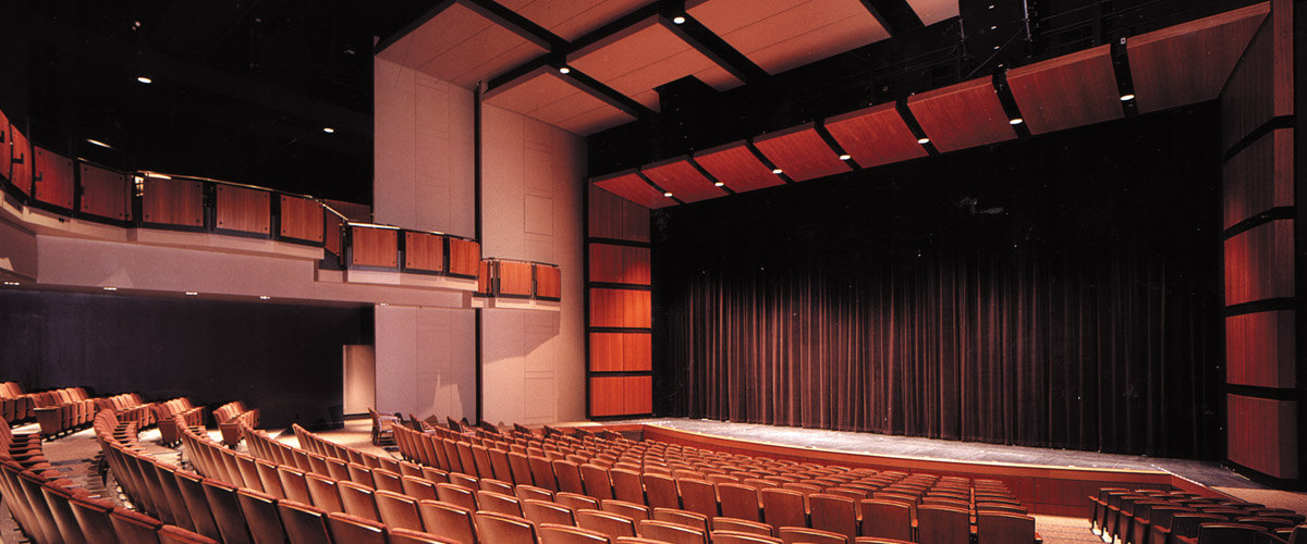 Interior of the Hatfield Hall auditorium showing seats, a balcony, and the stage. 