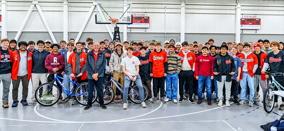 Members of the Triangle fraternity pose for a photo at Bikes for Tykes.