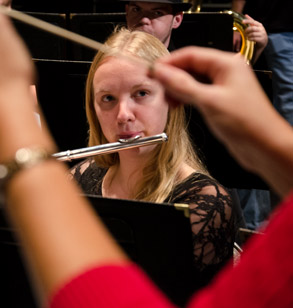 Female student playing the flute