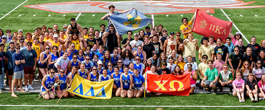 Image showing all the Greek organizations on the football field.