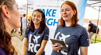 !Senior design team members explain project at Career Fair.