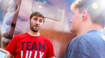 Student speaks with employer at Welcome Back Wednesday.