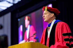 President Jim Conwell speaking at commencement in 2017