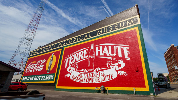 A three-story-high mural recognizing Terre Haute as the "Birthplace of the Coca-Cola Bottle."