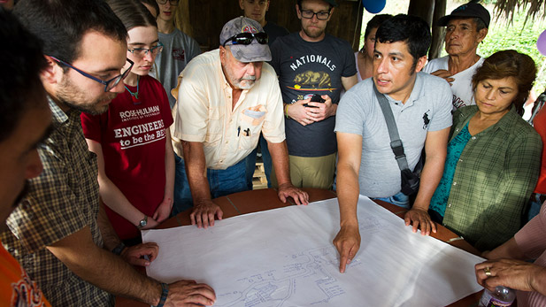 EWB team members look over project plans