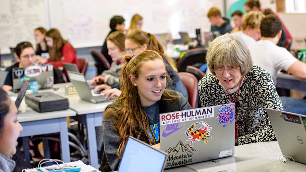 Professor Patsy Brackin working with a female student in the engineering design studio