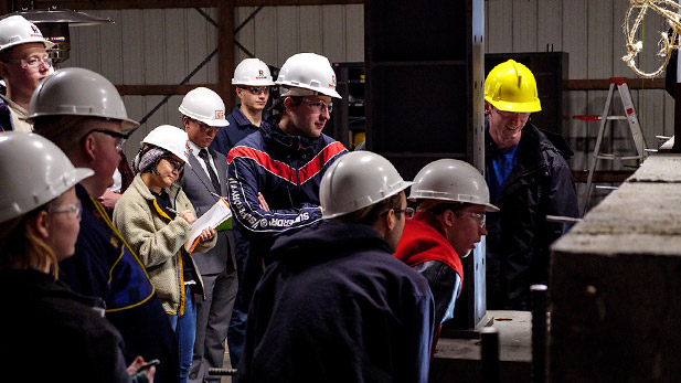 Civil Engineering students working in the structures lab..