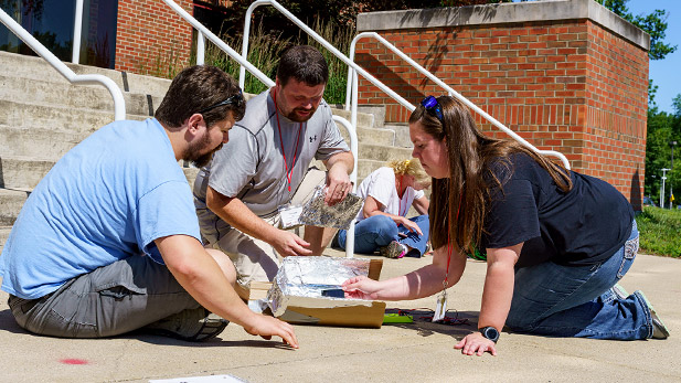 Teachers participating in a STEM activity