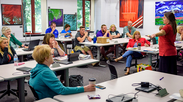 Rose-Hulman professor Jenny Mueller teaching to a class of Indiana K-12 teachers.