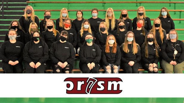 Image shows large group of West Vigo female students seated in a gymnasium wearing black EMERGE sweat shirts and COVID-19 masks. 