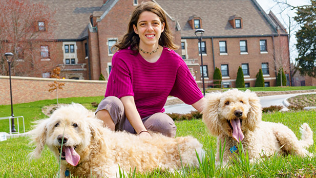 Ariel Bohner with her dogs on the Rose-Hulman campus.