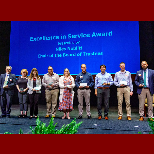 Rose Cares Behavioral Intervention Team standing on stage.