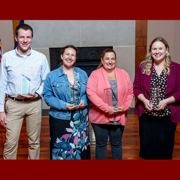 Award winners pose for a photo.