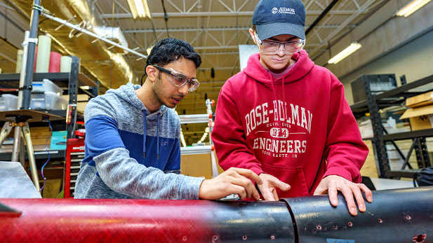 Rose-Hulman Rocketry Club students work on their rocket.