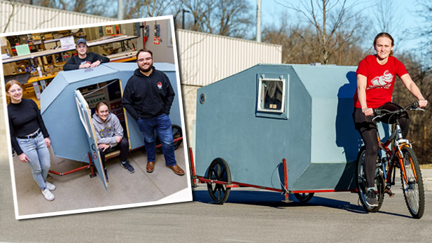 Rose-Hulman students in front of the mobile shelter they designed.