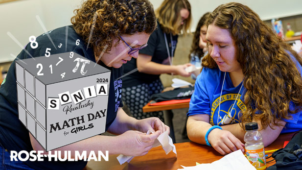 Faculty working with a student at Rose-Hulman's Sonia Math Day.