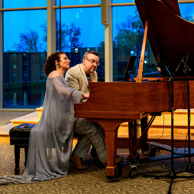 There are two images. Left: David Chapman teaches a class. Right: Clare Longendyke plays piano in the White Chapel.