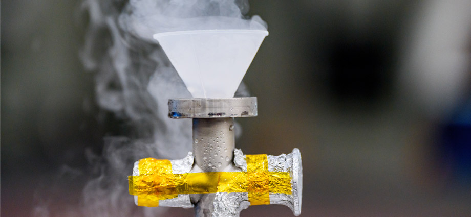 Dry ice spews out of the cryogenic testing apparatus.