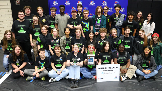 FIRST Robotics team members and mentors and their award.