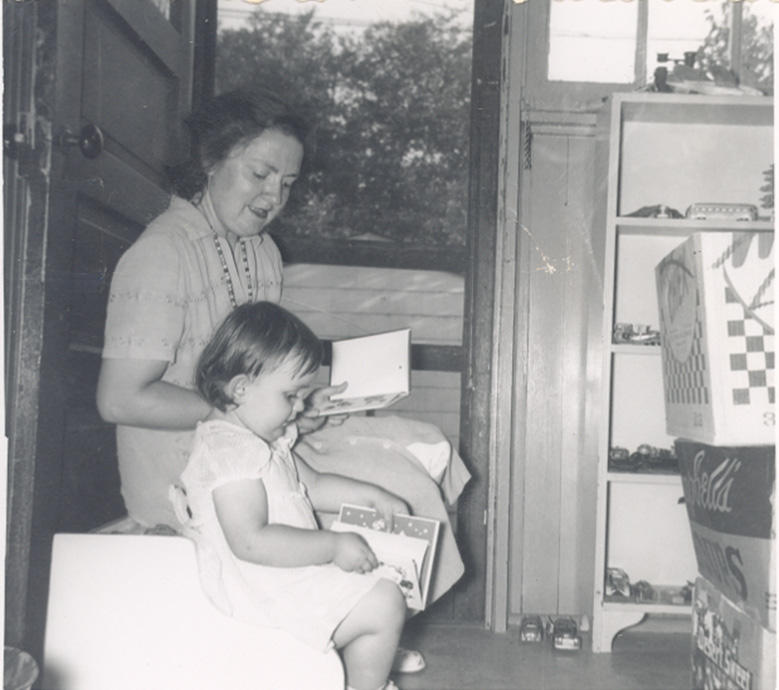 Mom reading to Sister